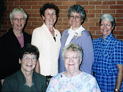 Back (L to R): Sisters Doris Jean Grewe, Carol Reeb, Glenda Becker, Judy Ann Obermark. Front (L to R): Sisters Frances Ann Eveler and Catherine DeWitt.