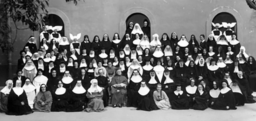 The Sisters pictured here were studying in Rome at Regina Mundi in 1954. The variety of religious habits is evident. Sister Mary Luke Baldwin, SSND, is in the first row, far right. Regina Mundi was one of the few academic institutions where women religious could receive advanced degrees in theology. 