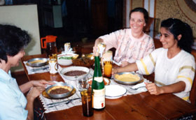 Sister Charlene Fill enjoying a meal with <br />friends in Paraguay.