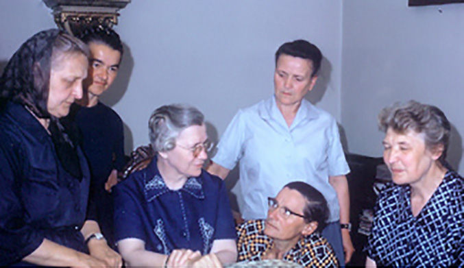 Romanian Sisters delighting in Mother Georgianne's (seated in center) presence.