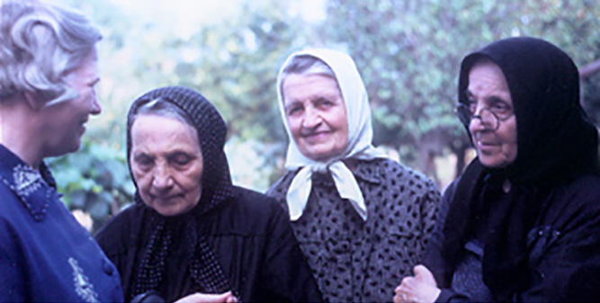 Mother Georgianne (at left) visiting with Sisters in Romania.