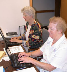 Sister Sue VonBank, SSND and Sister Gabriel Mary Spaeth, SSND record assessment data for the Nun Study. height=